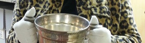 Dorothy Partridge holding the Dorothy Partridge Memorial Cup, honoring her Aunt Dorothy.